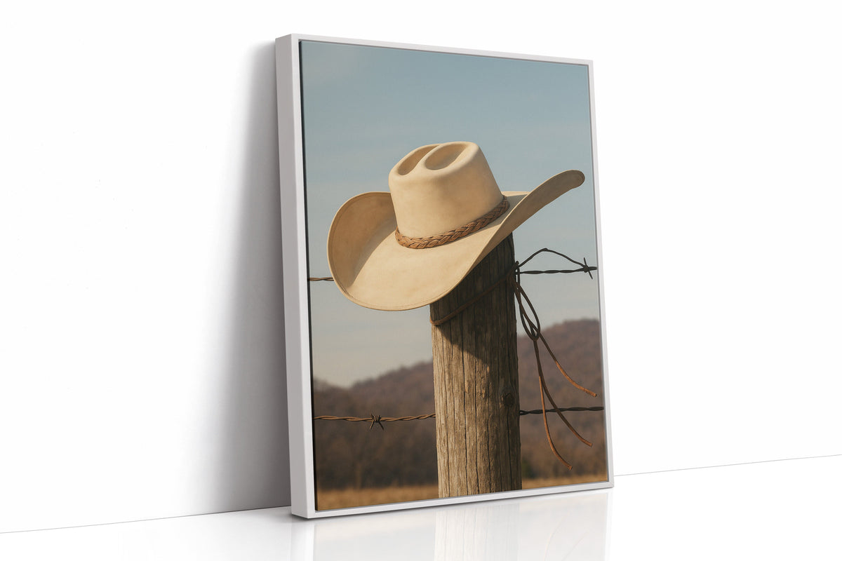 Cowboy Hat on Fence Post