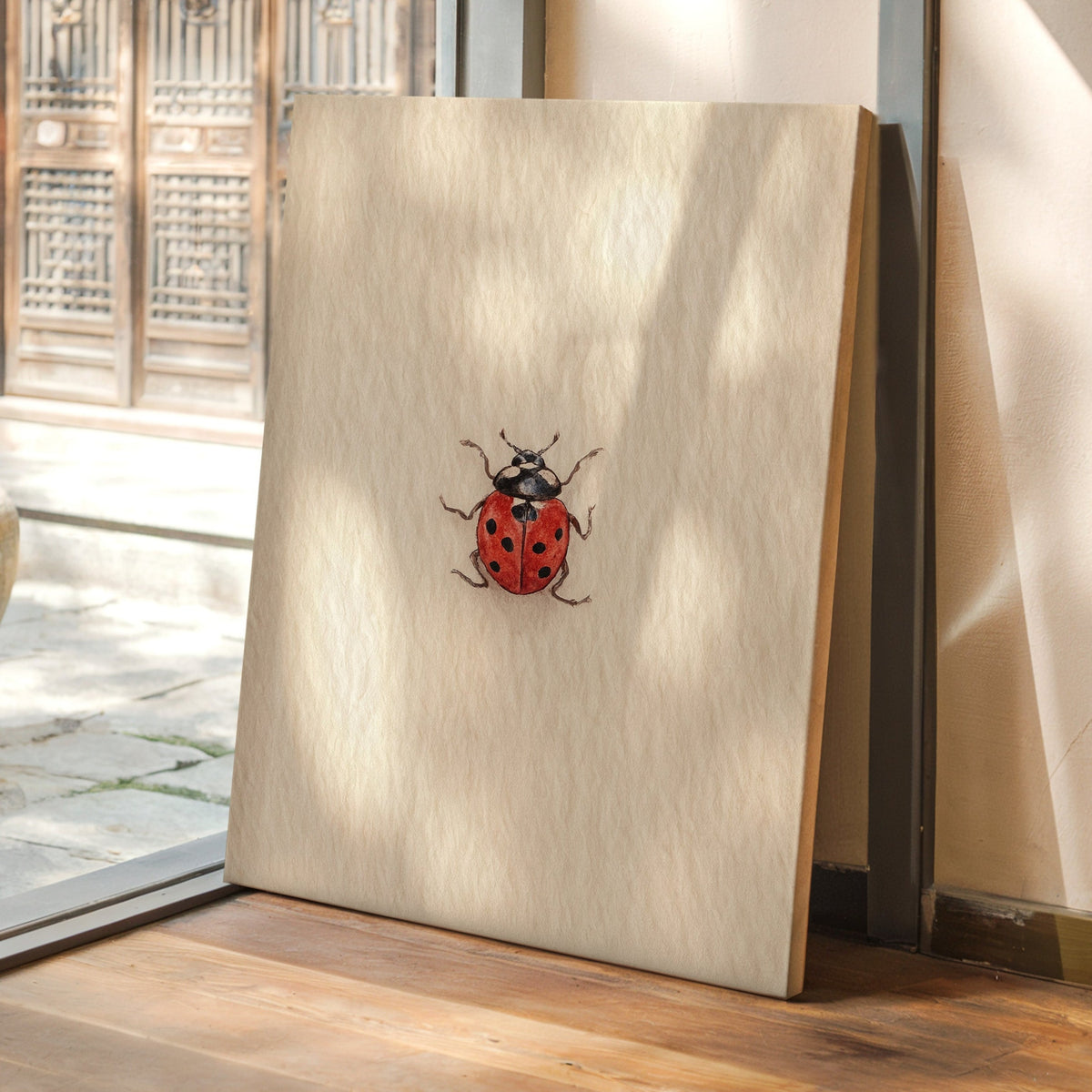 Tiny Ladybug on Paper
